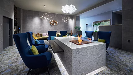 EcoSmart Fire Square 22 Fire Pit Kit brings vent-free bioethanol flames to Lexus Kamisu reception lounge table.