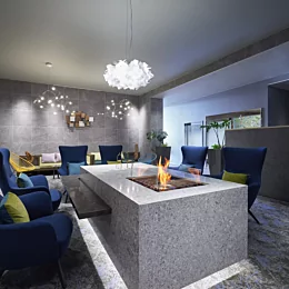 EcoSmart Fire Square 22 Fire Pit Kit brings vent-free bioethanol flames to Lexus Kamisu reception lounge table.